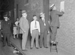 Boston Police in 1930 in Chinatown post a sign in Chinese warning against starting a Tong War. Boston Police in 1930 in Chinatown post a sign in Chinese warning against starting a Tong War. (Boston Public Library Leslie Jones Collection).