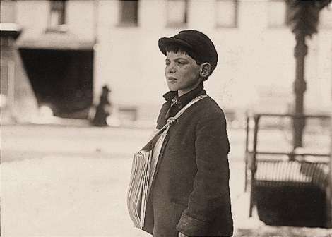 Hartford newsboy Tony Casale, 11, in 1909. He had been selling newspapers for four years, and sometimes until 10 p.m. His boss said his father bit him on the arm for not selling more papers. Said Tony, "Drunken men say bad words to us."