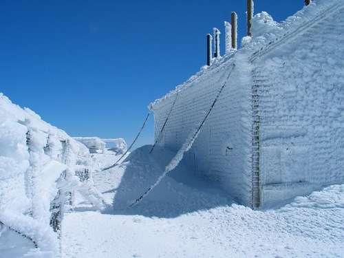Mt. Washington Observatory building chained to the ground in early April.